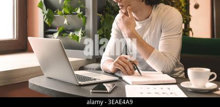 Pensive businessman pondering on creative ideas for startup Stock Photo
