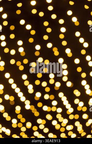 Festive Golden Light Dots Pattern for Holiday Design. Stock Photo