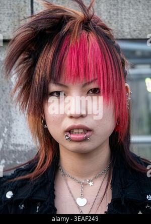Cosplay girl with pink hair in Harajuku, Kanto region, Tokyo, Japan Stock Photo