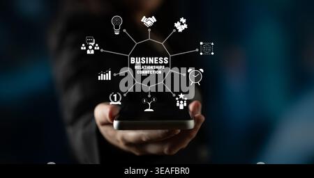 Business Connections and Relationship Building Visualized Through Mobile Technology in a Digital Age Quark. Stock Photo