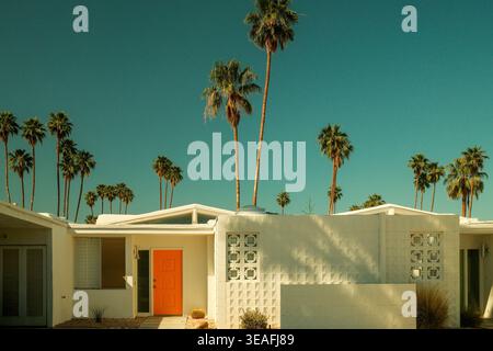 Mid-century modern house with orange front door in Palm Springs, California, USA Stock Photo
