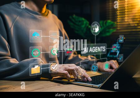 AI agents and intelligent workflow automation concept. Person using laptop with connected AI agent, code, cloud, search, folder, task icons. autonomou Stock Photo