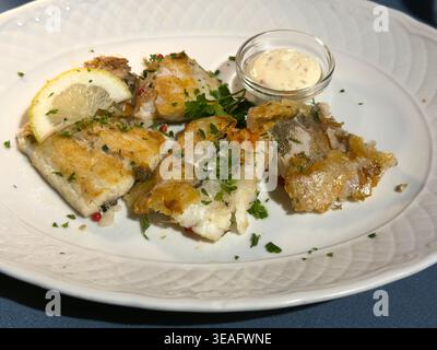 Plate of fried mixed fish Stock Photo
