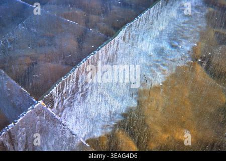 Frozen Lake Surface Close Up With Ice Textures and Subtle Winter Patterns Stock Photo