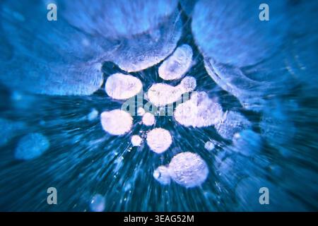 Frozen Methane Bubbles in Blue Ice Abstract Winter Macro Stock Photo