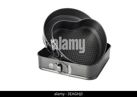 Set of nonstick springform baking pans in round, heart, and square shapes Stock Photo