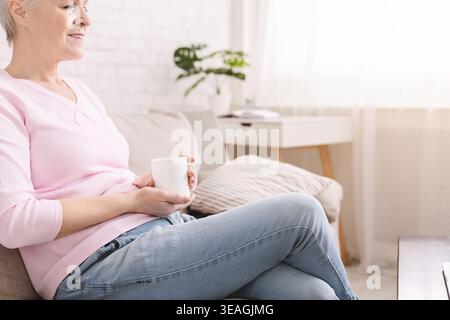 Collection of Moments Showing a Woman Enjoying Her Time on the Couch While Sipping Coffee Stock Photo