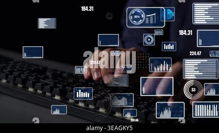 A close-up view of hands typing on a keyboard, enriched by floating graphical data visualizations that highlight the dynamic relationship between tech Stock Photo