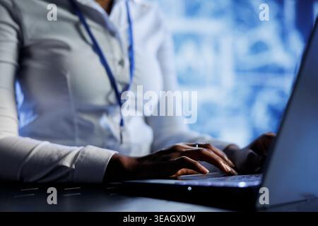 Computer scientist developing artificial intelligence neural networks nodes modeled after human brain. Diligent employee setting up AI machine learning accurately making predictions using data Stock Photo