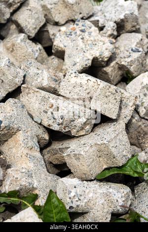 Urban Decay and Destruction Theme: Heap of Rough-Cut Concrete Pieces and Gravel Stock Photo