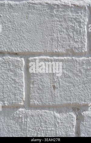 Abstract Background of Light and Shadow on a Bright White Textured Building Facade Stock Photo
