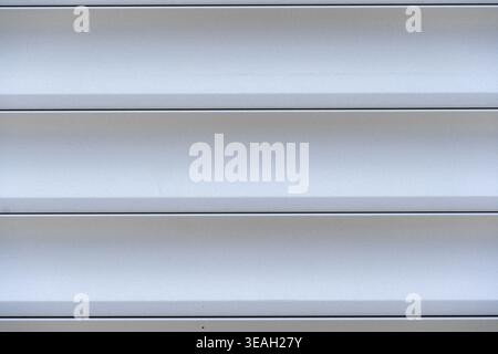 Clean Light Gray Horizontal Slat Texture Background of Garage Door or Rolling Shutter, Seamless Modern Metal Surface: Full Frame Abstract Pattern of H Stock Photo