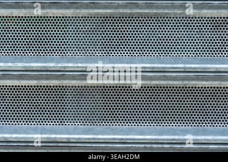 Galvanized Perforated Metal Security Shutter Texture with Horizontal Slats and Pattern Stock Photo