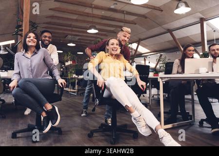 Business team of software developers having fun in office Stock Photo