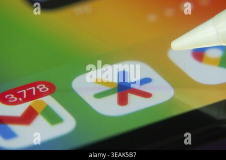 16 Nov 2025- Dhaka, Bangladesh: Stylus touching the Google Authenticator app icon on a smartphone screen Stock Photo