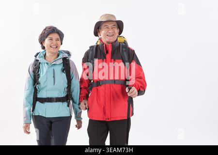 an old couple hiking together Stock Photo
