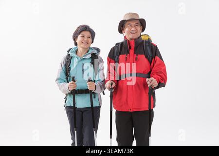 an old couple hiking together Stock Photo