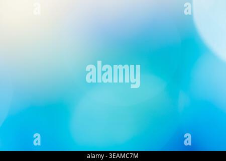 Soft blue and turquoise abstract blurred gradient background with bokeh light effect Stock Photo