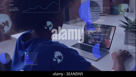Analyzing woman in blue top reviewing code on laptop with data visualizations at white desk. Remote, collaboration, programming, developer, charts, gl Stock Photo