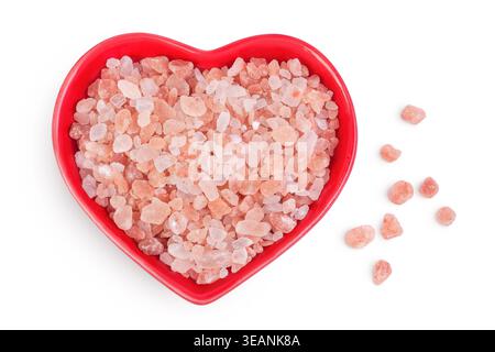 Pink Himalayan salt in ceramic bowl isolated on white background. Top view. Stock Photo