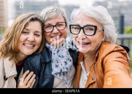 Group of senior women taking happy selfie Stock Photo