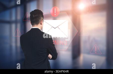Digital warning mail interface highlights email threat detection, security monitoring, and proactive prevention of phishing and malware intrusions Stock Photo