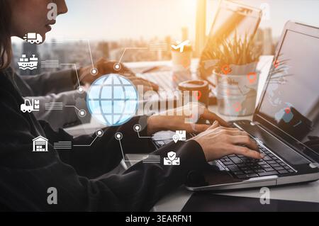 Professionals are collaborating on logistics tasks with modern technology in a stylish office space, highlighting global connectivity and efficiency Stock Photo