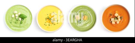 Different tasty soups in bowls isolated on white, set. Top view Stock Photo