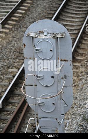 Close-up of slightly rusted back side of railway semaphore signal Stock Photo