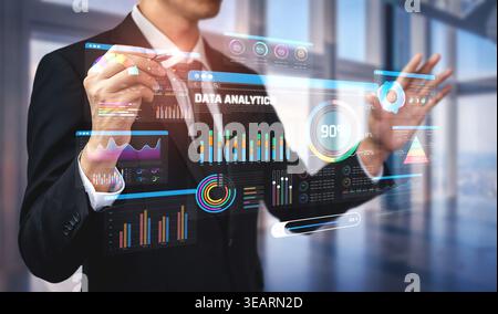 Business Professional Interacting with Touchscreen Display of Data Analytics and Visualization in Modern Office Environment Sigmoid Stock Photo