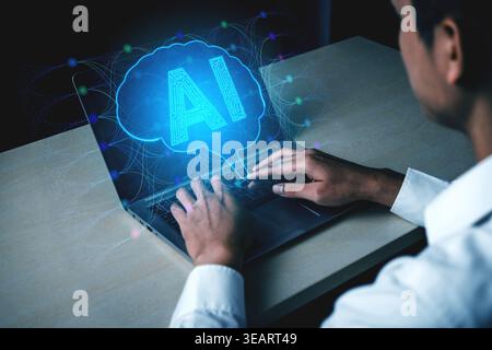 Person Using Laptop with AI Concept Illustration in Dark Room Representing Technology and Future Innovations Sigmoid Stock Photo