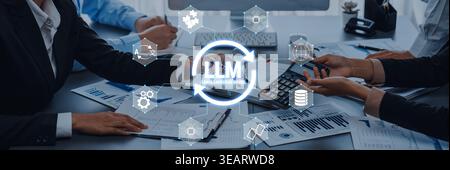 Business professionals collaborating on financial analysis and digital data management using technology and innovative solutions in a modern office Stock Photo