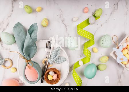 Colorful Easter Eggs and Spring Ribbon on Marble Table Stock Photo