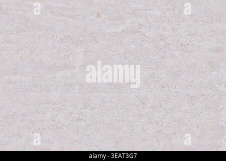 Macro view of a beige limestone surface with natural grain and subtle veins. Elegant stone texture background for architecture, flooring, and interior Stock Photo