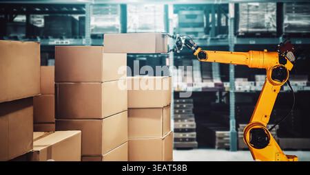 Smart robot arm system for innovative warehouse and factory digital technology . Automation manufacturing robot controlled by industry engineering Stock Photo