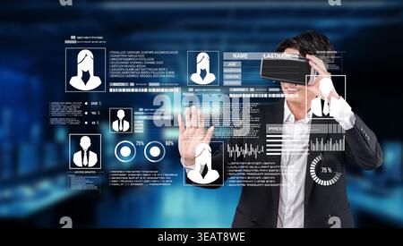 A professional individual interacts with advanced virtual reality technology in a futuristic cybersecurity setting, emphasizing the importance of Stock Photo