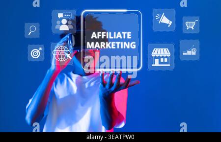 A dynamic image showcasing a person interacting with a digital interface focused on affiliate marketing concepts, set against a vibrant blue Stock Photo
