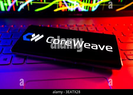 CoreWeave Cloud Computing Infrastructure Company Logo Displayed On Screen With Stock Market Financial Performance Chart And Technology Background Stock Photo