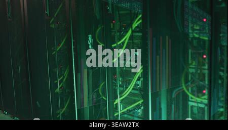 Displaying rack-mounted servers and green or yellow cables in data center, with LED status indicator Stock Photo