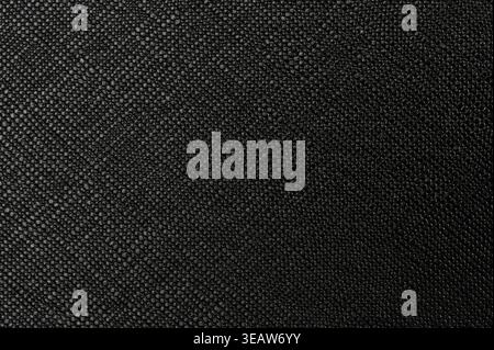 Black soft cloth dotted surface material macro close up view Stock Photo