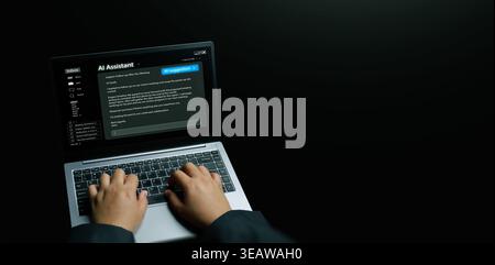 AI assistant concept. Hands using a laptop with an AI suggesting and generating an email reply. Generative artificial intelligence for productivity, l Stock Photo