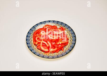 Decorative arrangement of brightly cut vegetables on decorative base Stock Photo