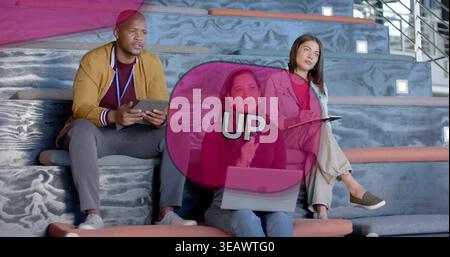 Speaking woman holding mic and laptop on steps, peers with tablets and lanyards, magenta UP graphic Stock Photo