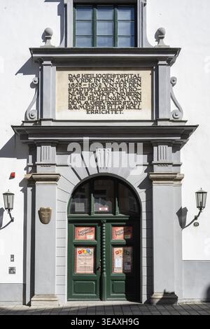 The Holy Spirit Hospital with the entrance to the world-famous Augsburg doll box, puppet theater and puppet theater museum in the old town of Augsburg Stock Photo