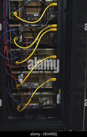 Hardware, cables and computing equipment in server room for database storage, cybersecurity or power. IT system, rack and wiring in data center for Stock Photo