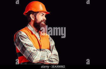 Builder. Builder in hard hat, foreman or repairman in helmet. Man builders, industry. Building helmet or hard hat Stock Photo