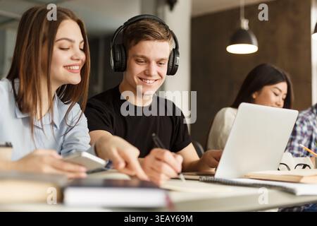 Students Collaborate on Projects in Modern Study Space During a Busy Afternoon Stock Photo