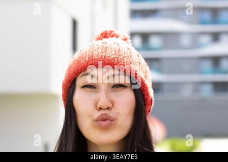 Woman with red hat and kissable lips Stock Photo