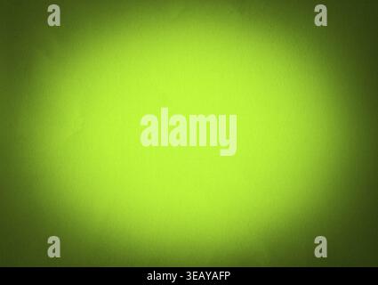 Yellow green colour paper useful as a background vignetted Stock Photo