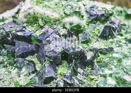 Broken glass, green color abstract background Stock Photo
